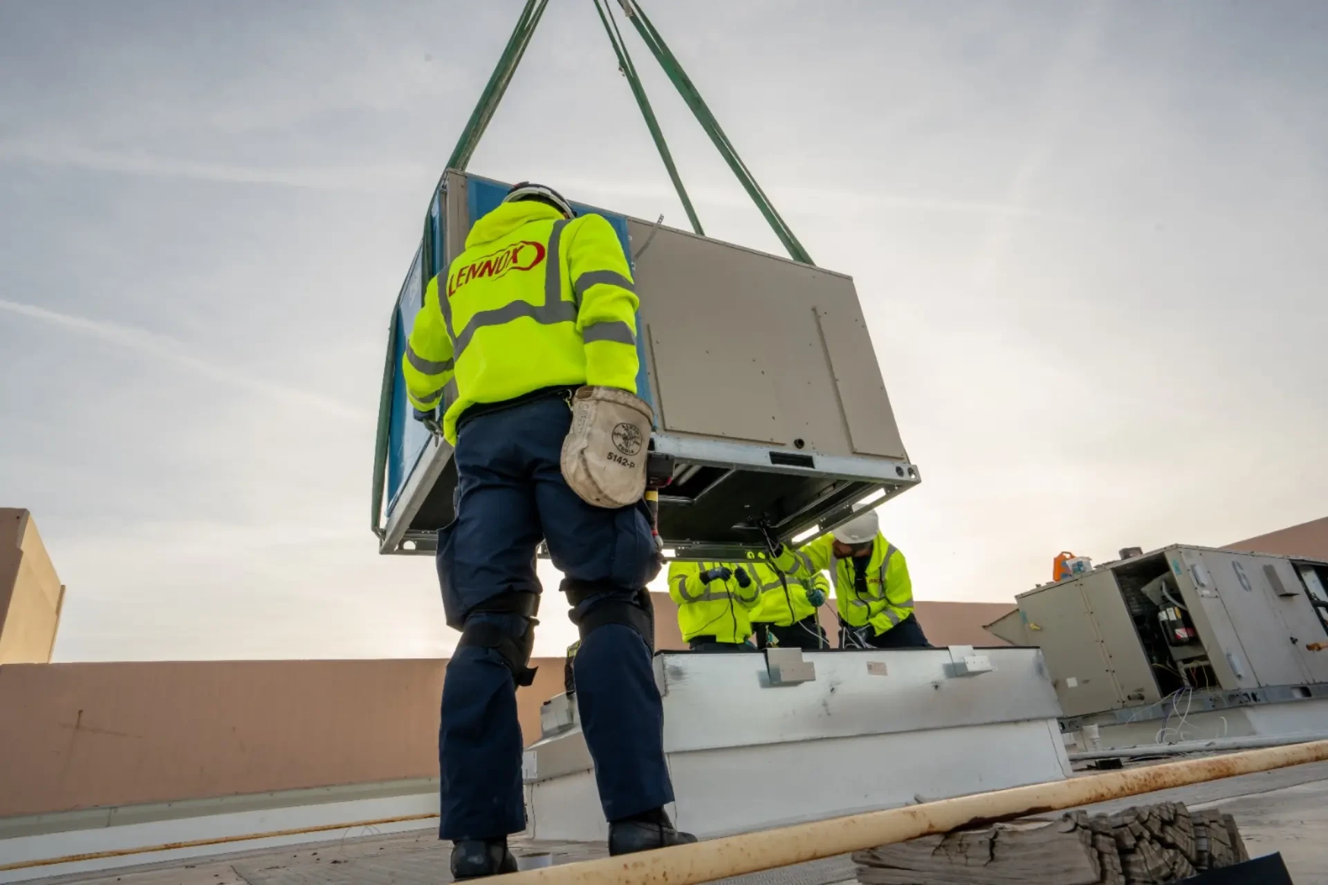 Crane lift AC unit replacement rooftop Chicago commercial HVAC service